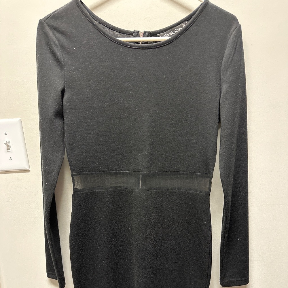 Black long sleeve dress with mesh detail at waist